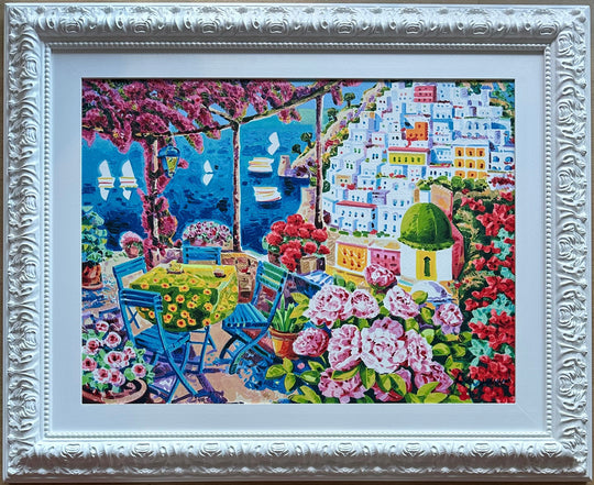 Opera incorniciata: Le sedie azzurre nella luce di Positano  | Athos Faccincani